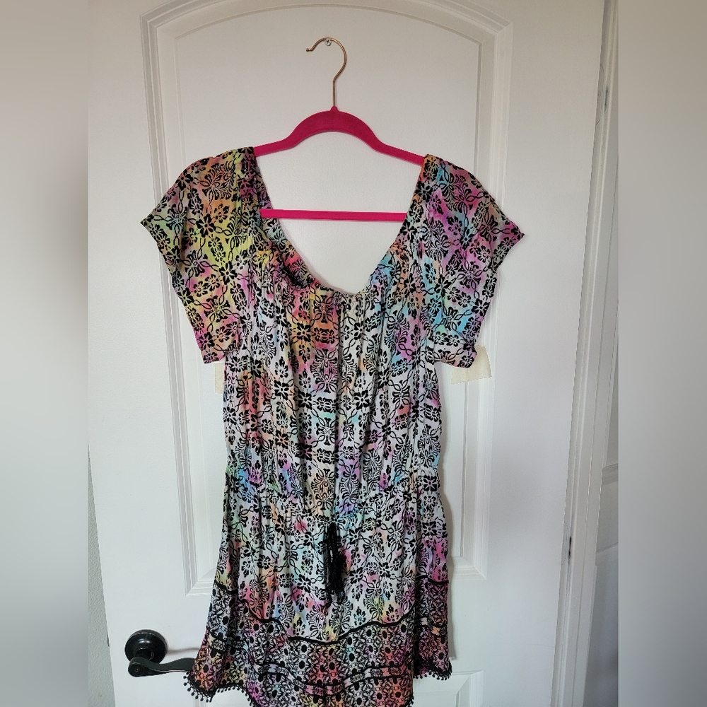Off the shoulder black white floral and rainbow colored romper